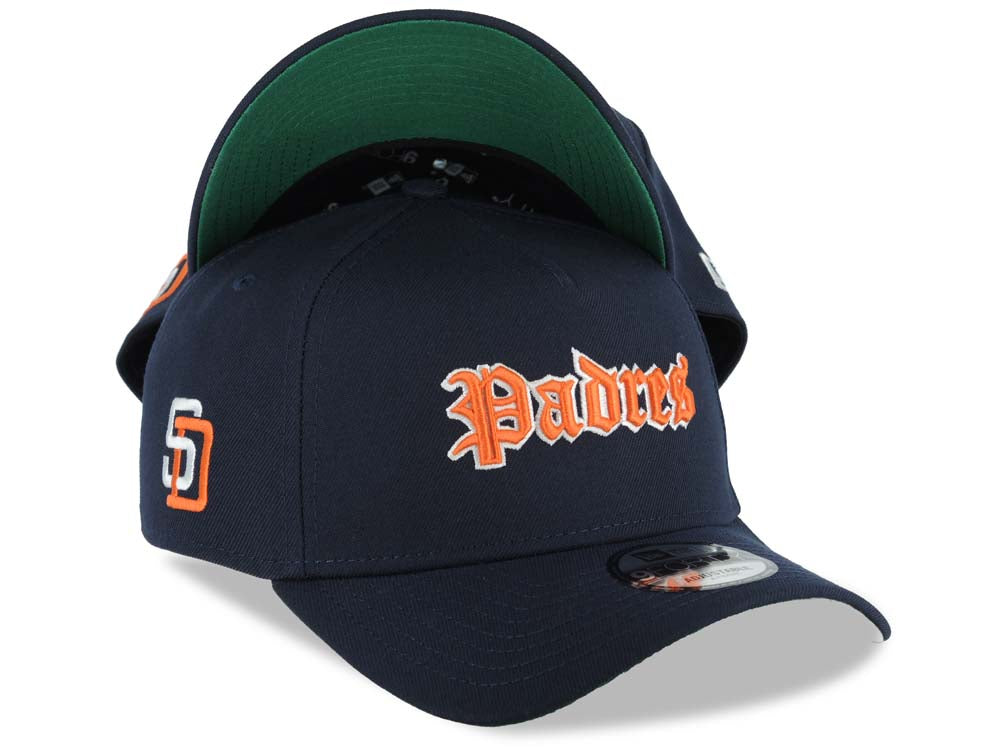 San Diego Padres New Era MLB 9FORTY 940 Adjustable A-Frame Hat Navy Blue Crown/Visor Orange/White Script/Text Logo SD Side Patch Green UV