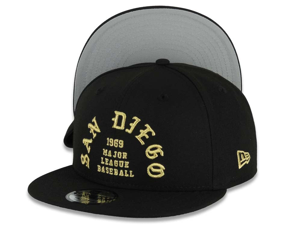 San Diego Padres New Era MLB 9FIFTY 950 Snapback Cap Hat Black Crown/Visor Metallic Gold 1969 Major League Baseball Text/Script Logo Gray UV