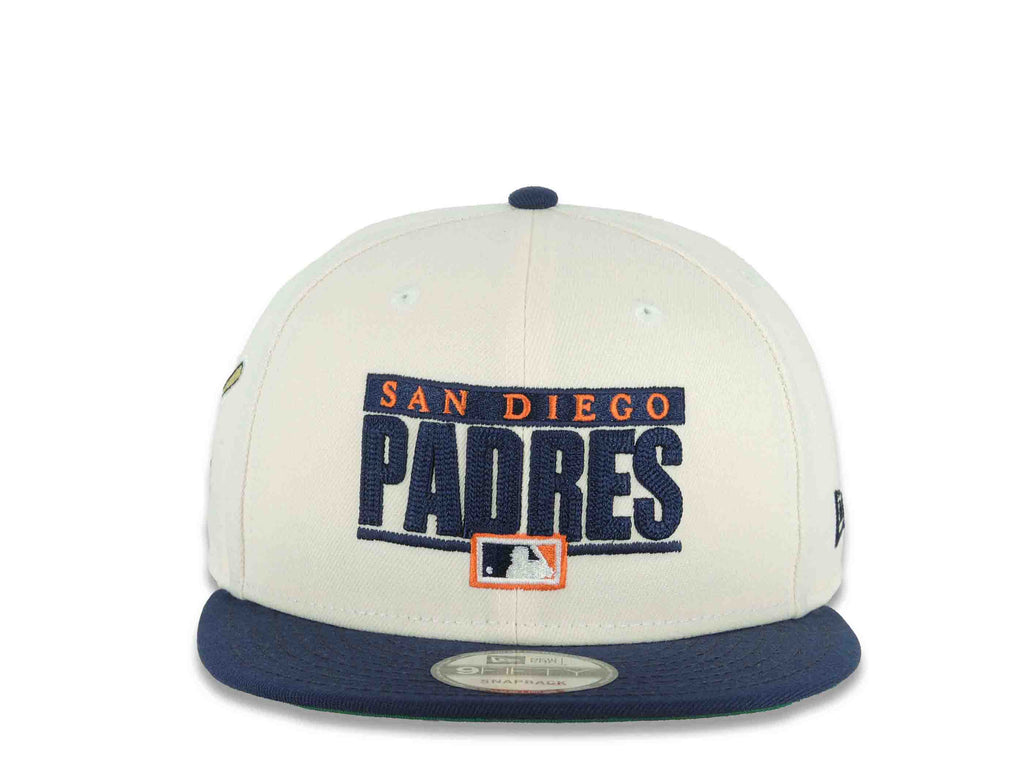 San Diego Padres New Era MLB 9FIFTY 950 Snapback Cap Hat Cream Crown Navy Blue Visor Navy Blue/Orange Script Logo Swinging Friar Side Patch Green UV