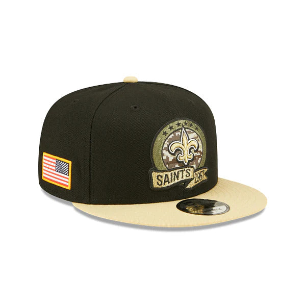 New Orleans Saints New Era NFL 9FIFTY 950 Snapback Cap Hat Black Crown Wheat Visor Camo Logo (2022 Salute To Service)